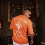 Polo Naranja Money Club para Hombre
